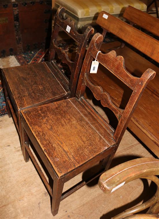 A pair of early 19th century oak wood seat dining chairs,